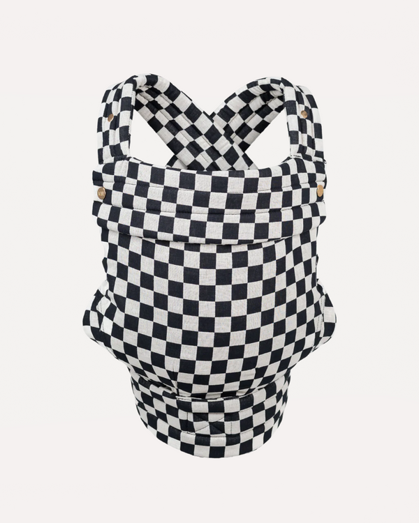 Black and white checkered Mabē Buckle Carrier against a white background